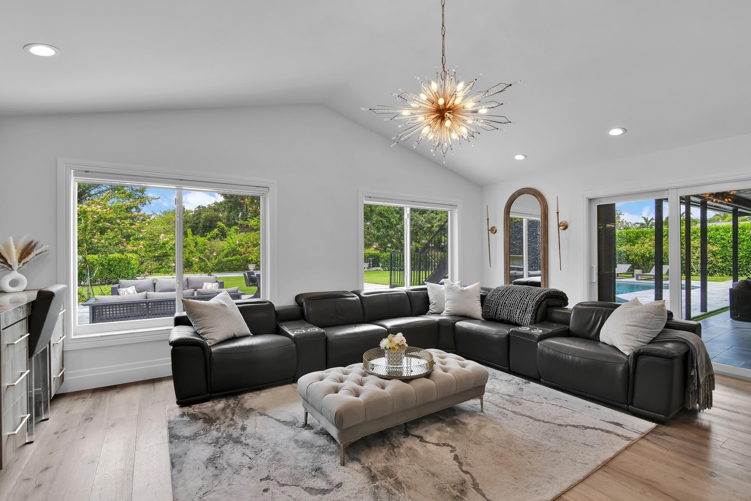 21082 North Sweetwater Lane Boca Raton, FL 33428 - Photo 21 of 75 a living room with furniture and a large window