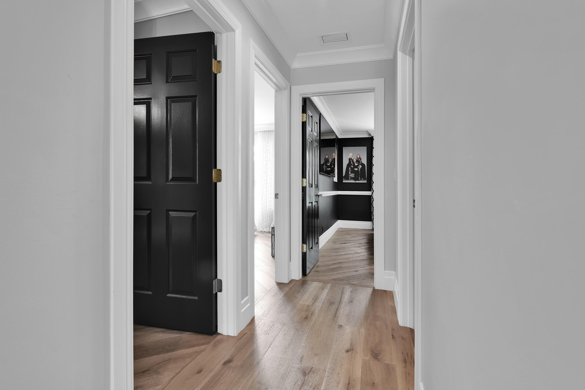 21082 North Sweetwater Lane Boca Raton, FL 33428 - Photo 27 of 75 a view of a hallway with wooden floor and closet