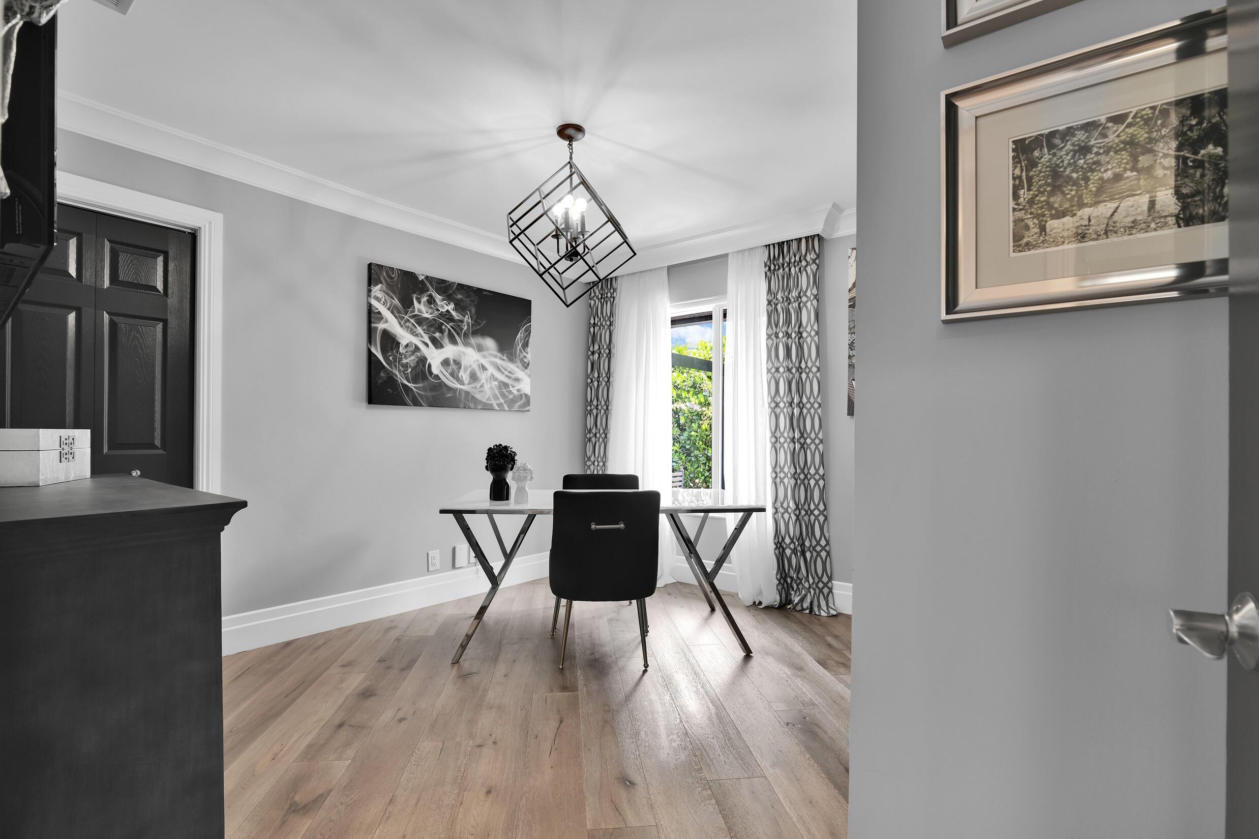 21082 North Sweetwater Lane Boca Raton, FL 33428 - Photo 29 of 75 a view of a dining room with furniture window and wooden floor