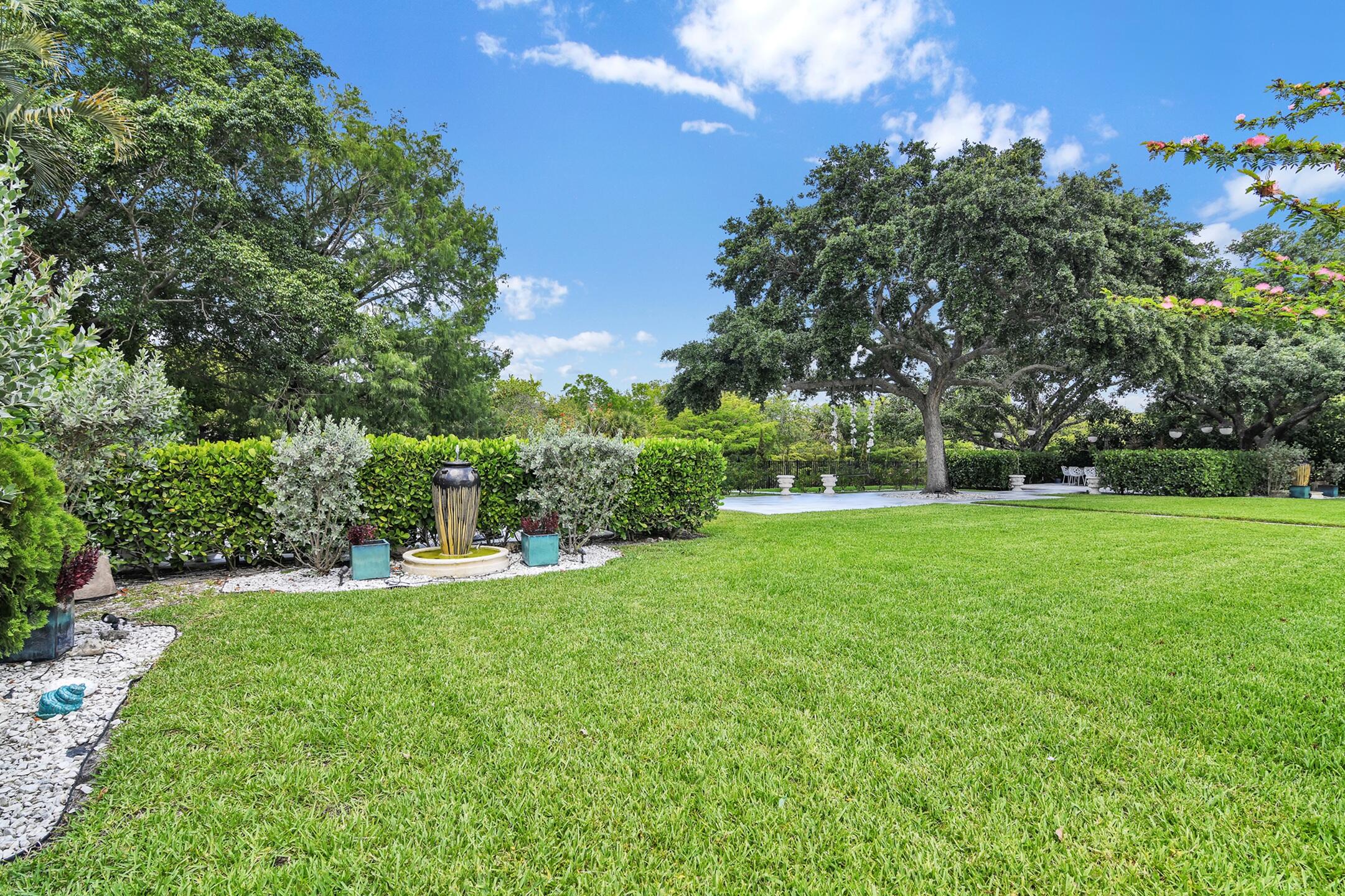 21082 North Sweetwater Lane Boca Raton, FL 33428 - Photo 46 of 75 a view of garden with trees