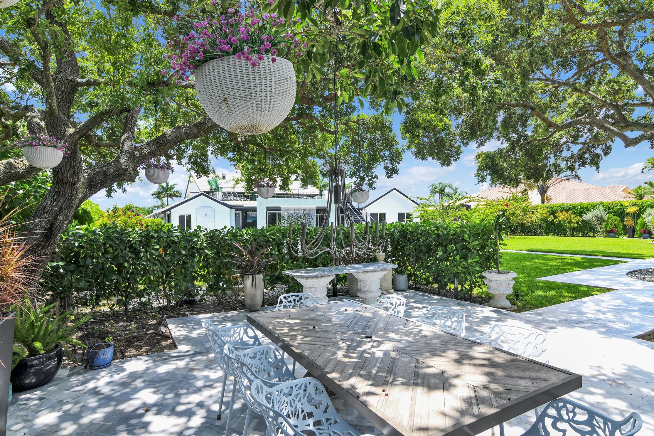 21082 North Sweetwater Lane Boca Raton, FL 33428 - Photo 48 of 75 a view of a backyard