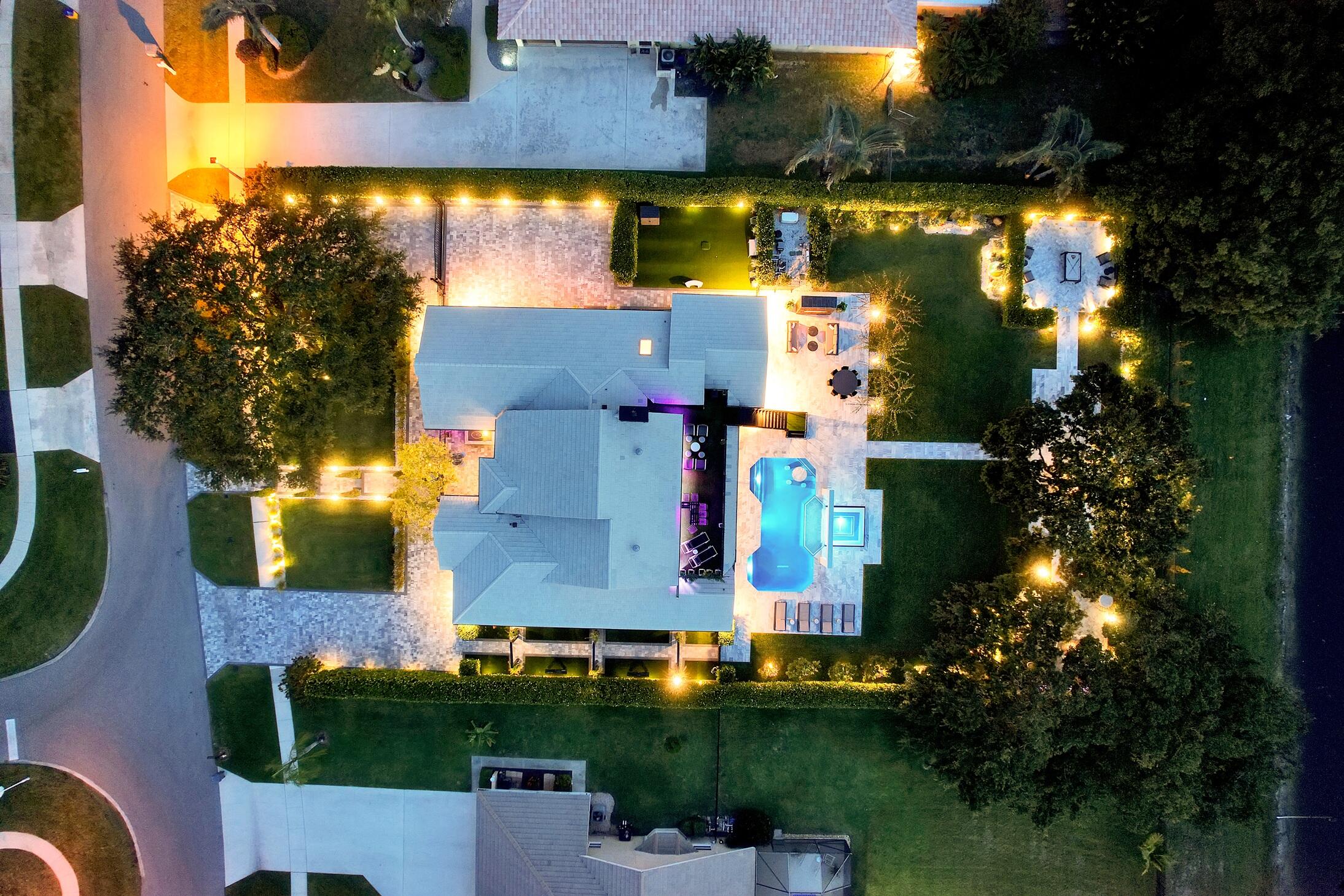 21082 North Sweetwater Lane Boca Raton, FL 33428 - Photo 63 of 75 an aerial view of multiple houses with yard