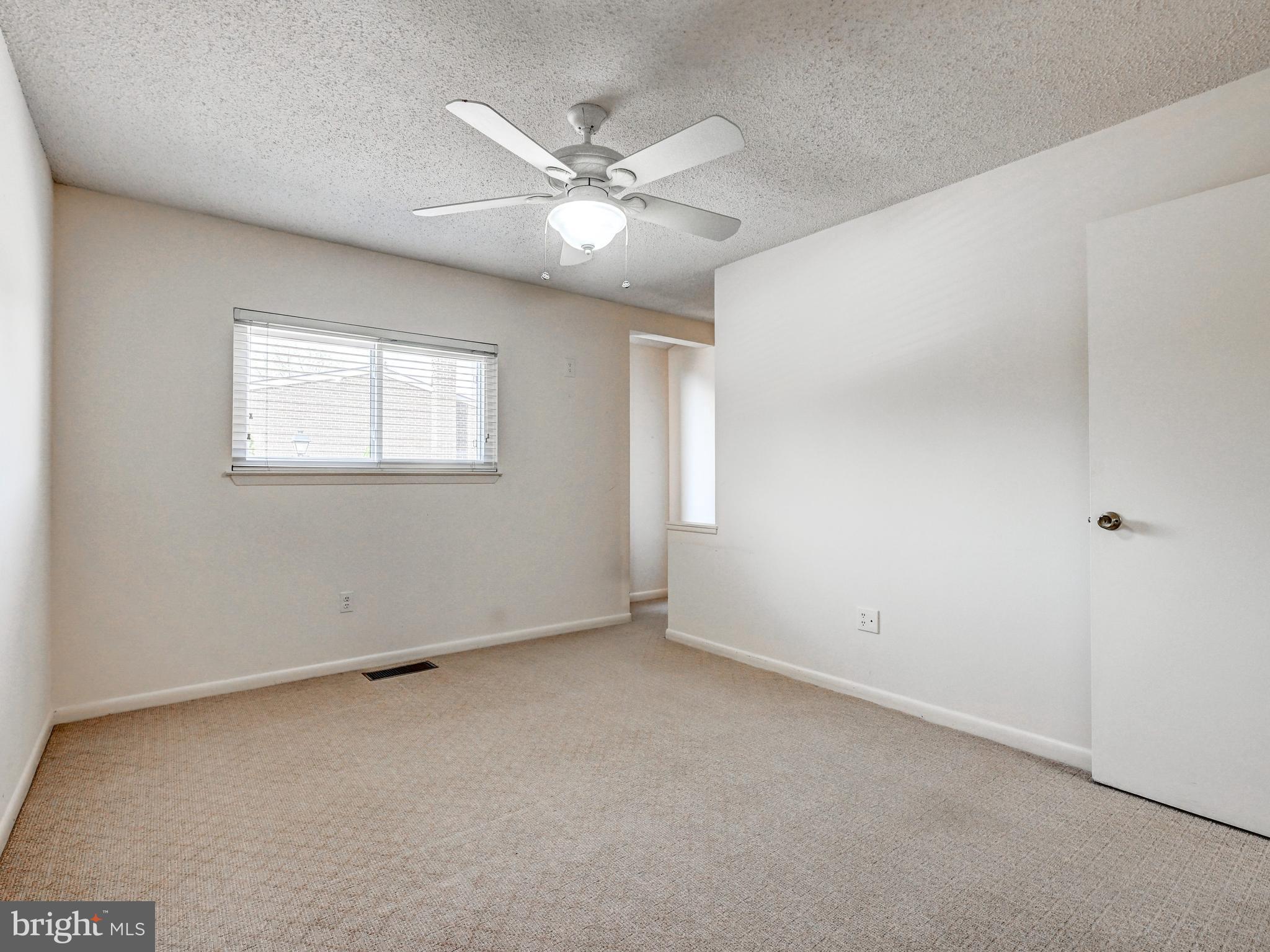 17 Pacers Lane, Unit F Pikesville, MD 21208 - Photo 21 of 24 Bedroom 2 - all neutral!