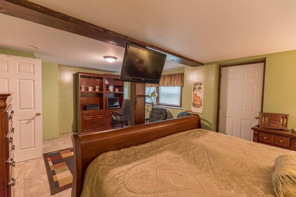 111 Sherbert Road Ashburnham, MA 01430 - Photo 14 of 18 a bed room with a bed and television