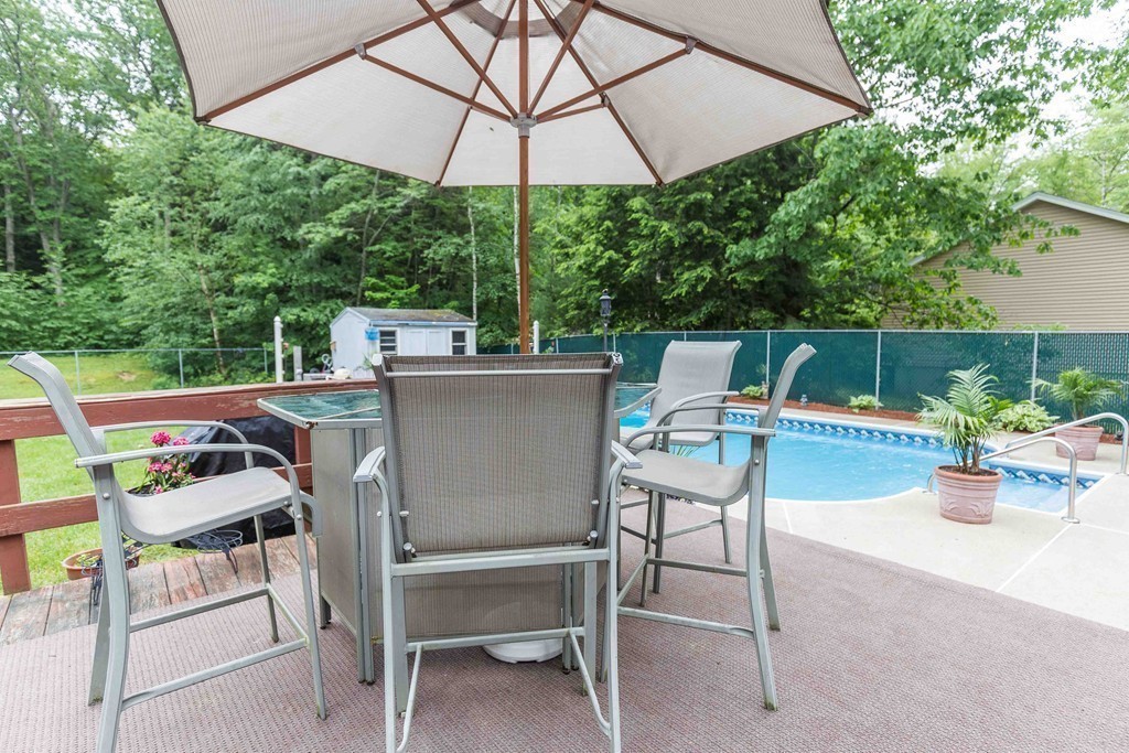 111 Sherbert Road Ashburnham, MA 01430 - Photo 16 of 18 a view of backyard of house with seating space