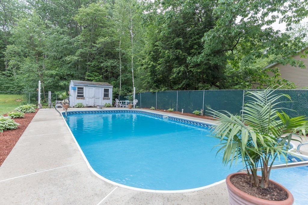111 Sherbert Road Ashburnham, MA 01430 - Photo 17 of 18 a view of a swimming pool with a patio
