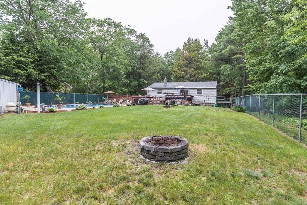 111 Sherbert Road Ashburnham, MA 01430 - Photo 18 of 18 a view of a house with a yard and sitting area