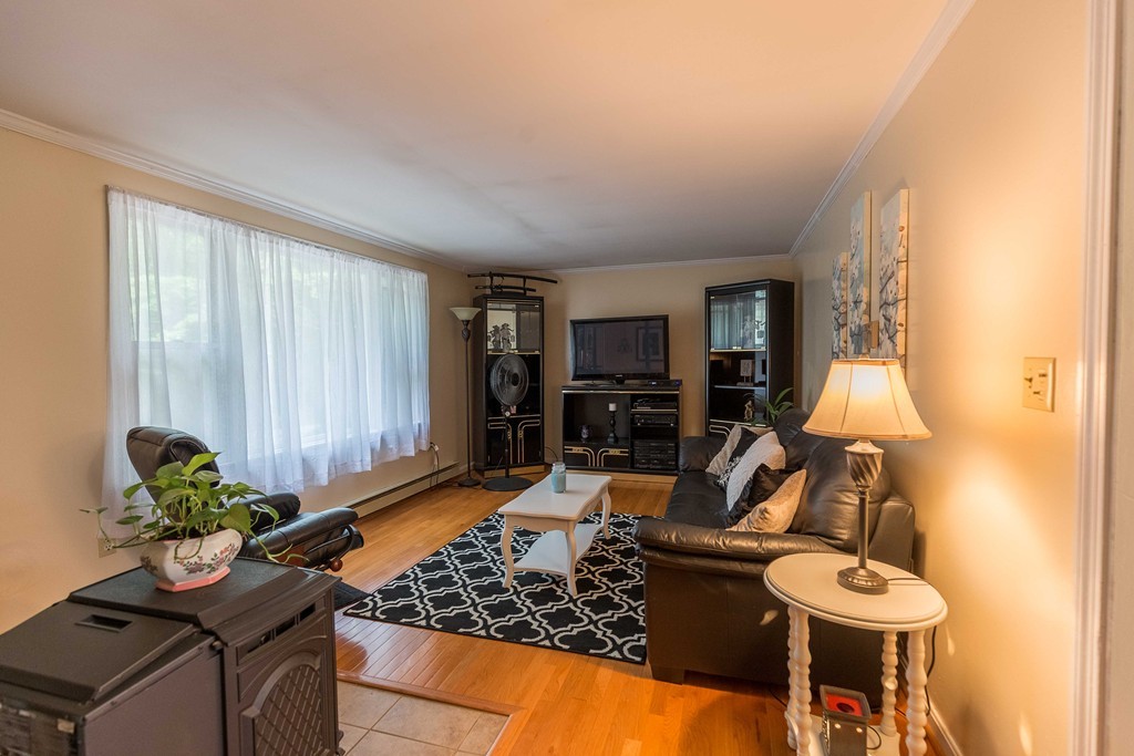 111 Sherbert Road Ashburnham, MA 01430 - Photo 5 of 18 a living room with furniture and a potted plant