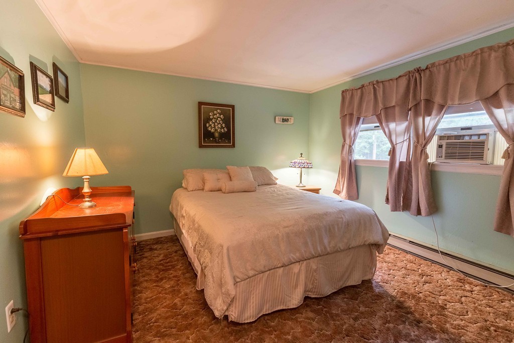 111 Sherbert Road Ashburnham, MA 01430 - Photo 7 of 18 a bedroom with a bed and a window