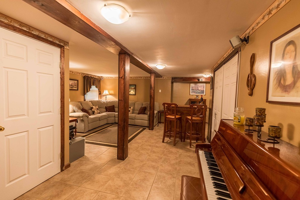 111 Sherbert Road Ashburnham, MA 01430 - Photo 10 of 18 a room with lots of chairs and mirrors