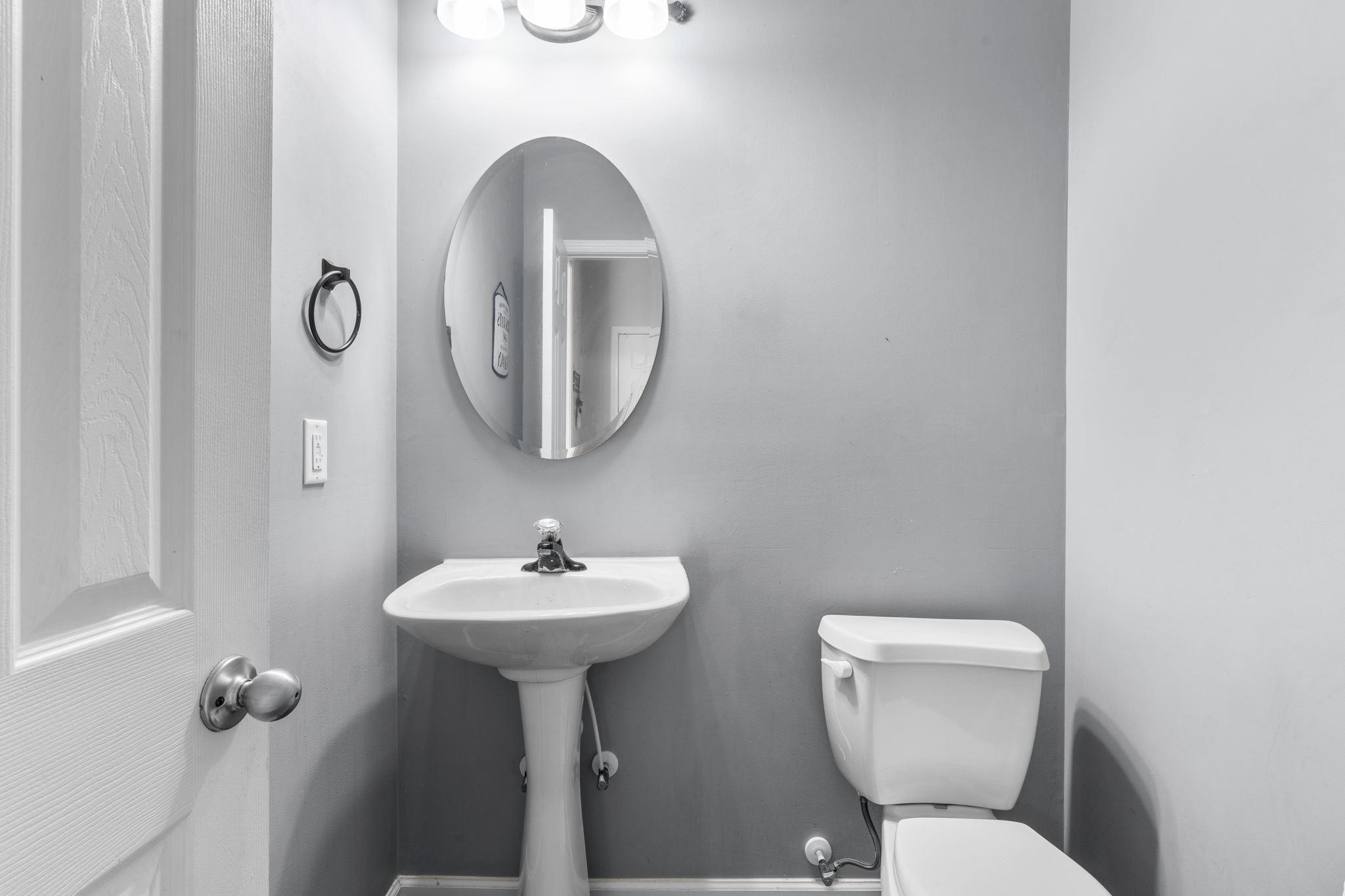 109 Riley Oaks Lane Apex, NC 27539 - Photo 12 of 35 First Floor Half Bathroom