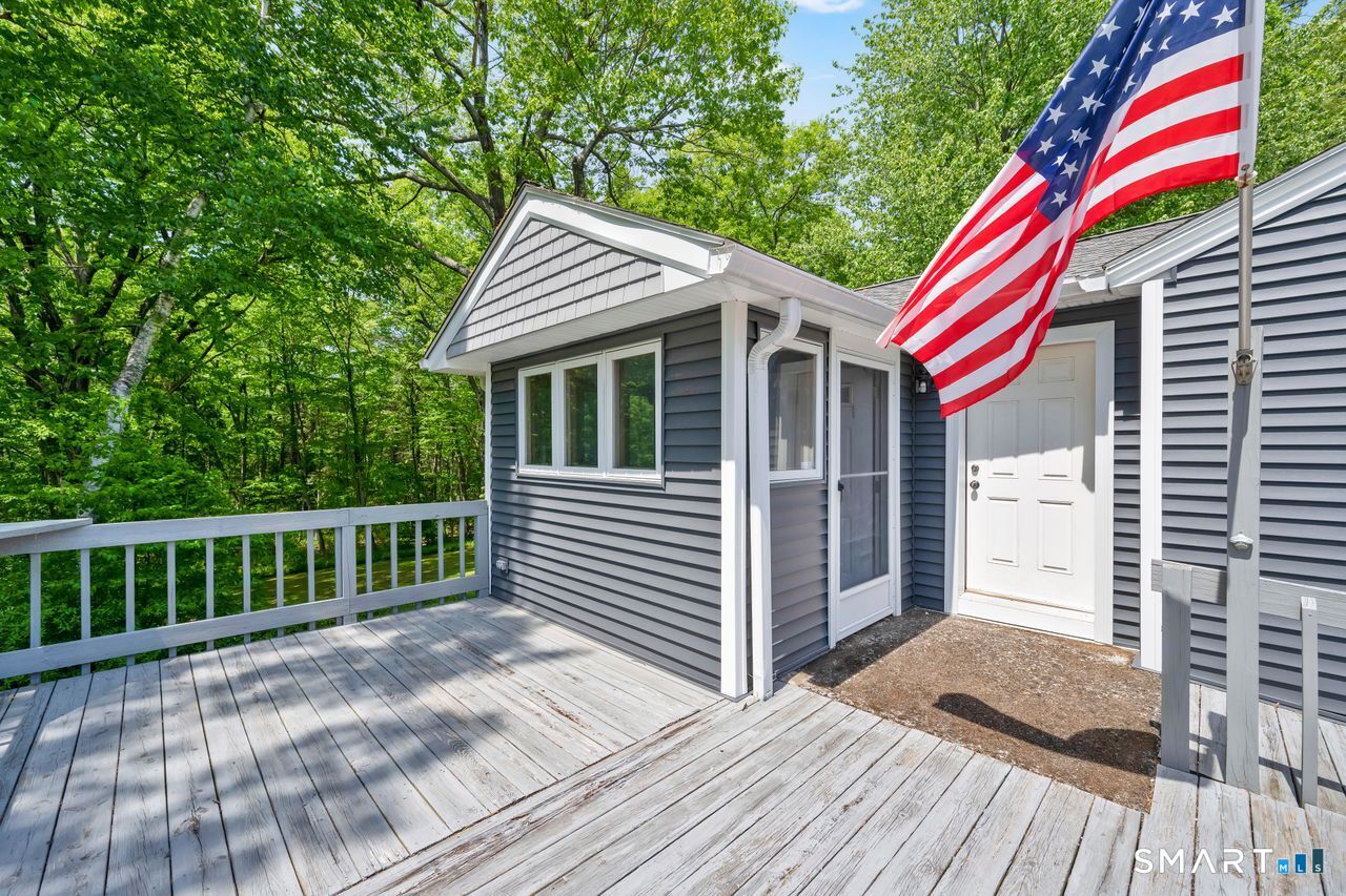 1013 Ratley Road Suffield, CT 06093 - Photo 33 of 39 a view of a house with a deck