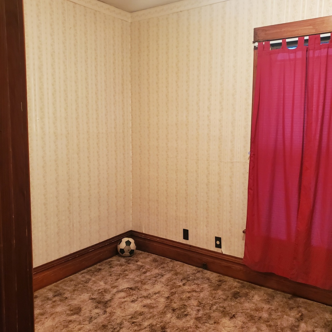 130 South 5th Street Sheldon, IL 60966 - Photo 14 of 28 a view of a room with wooden walls