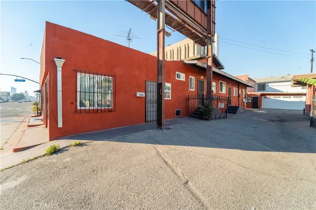 a view of a house with a street