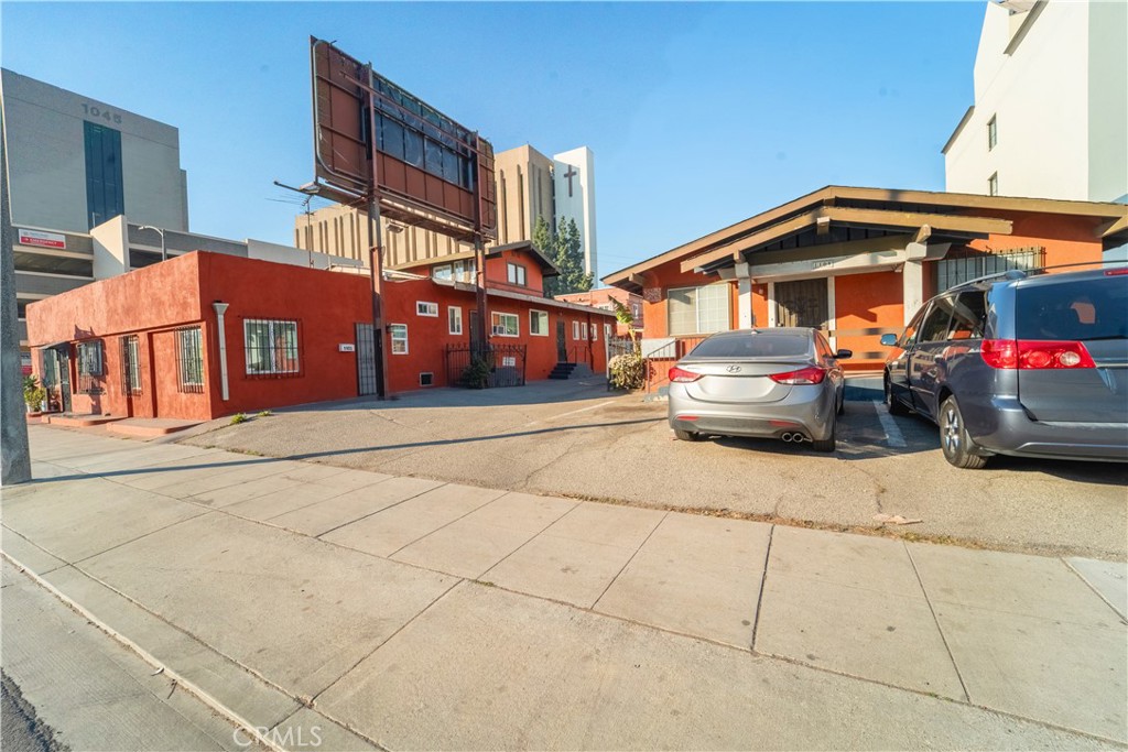 1101 Atlantic Avenue Long Beach, CA 90813 - Photo 7 of 15 a front view of a house with parking space