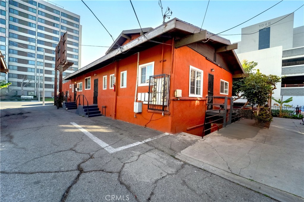 1101 Atlantic Avenue Long Beach, CA 90813 - Photo 8 of 15 a backyard of a house with yard and outdoor seating