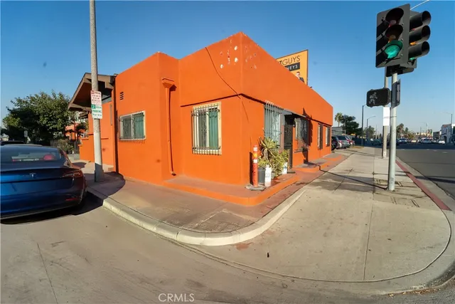 a view of street with parked cars