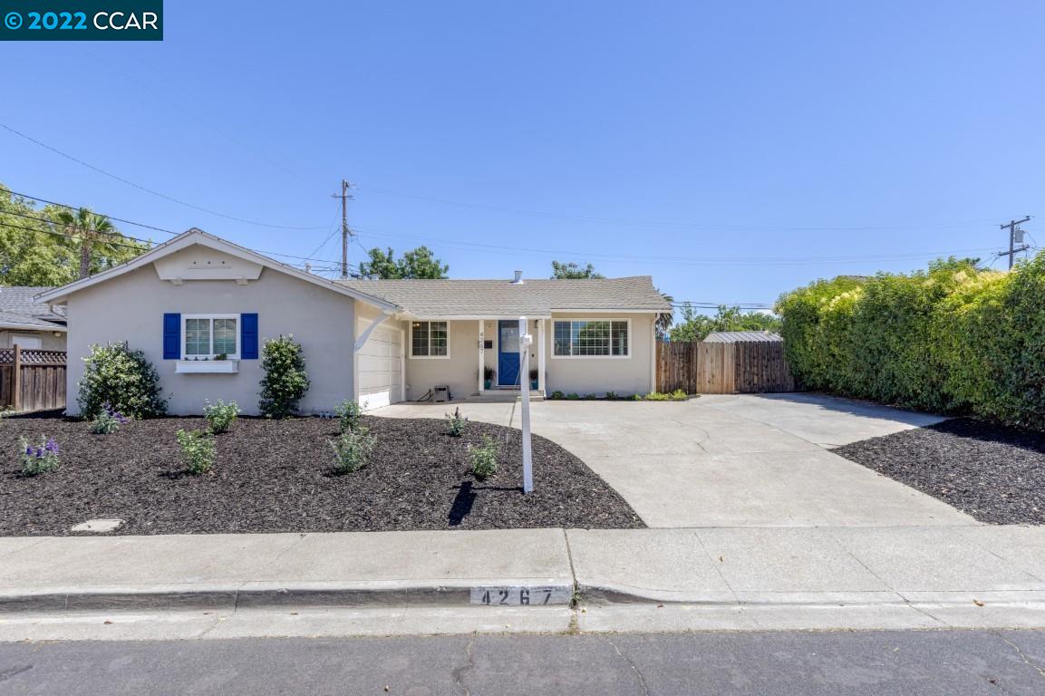 4267 Armand Drive Concord, CA 94521 - Photo 1 of 1 a front view of a house with garage