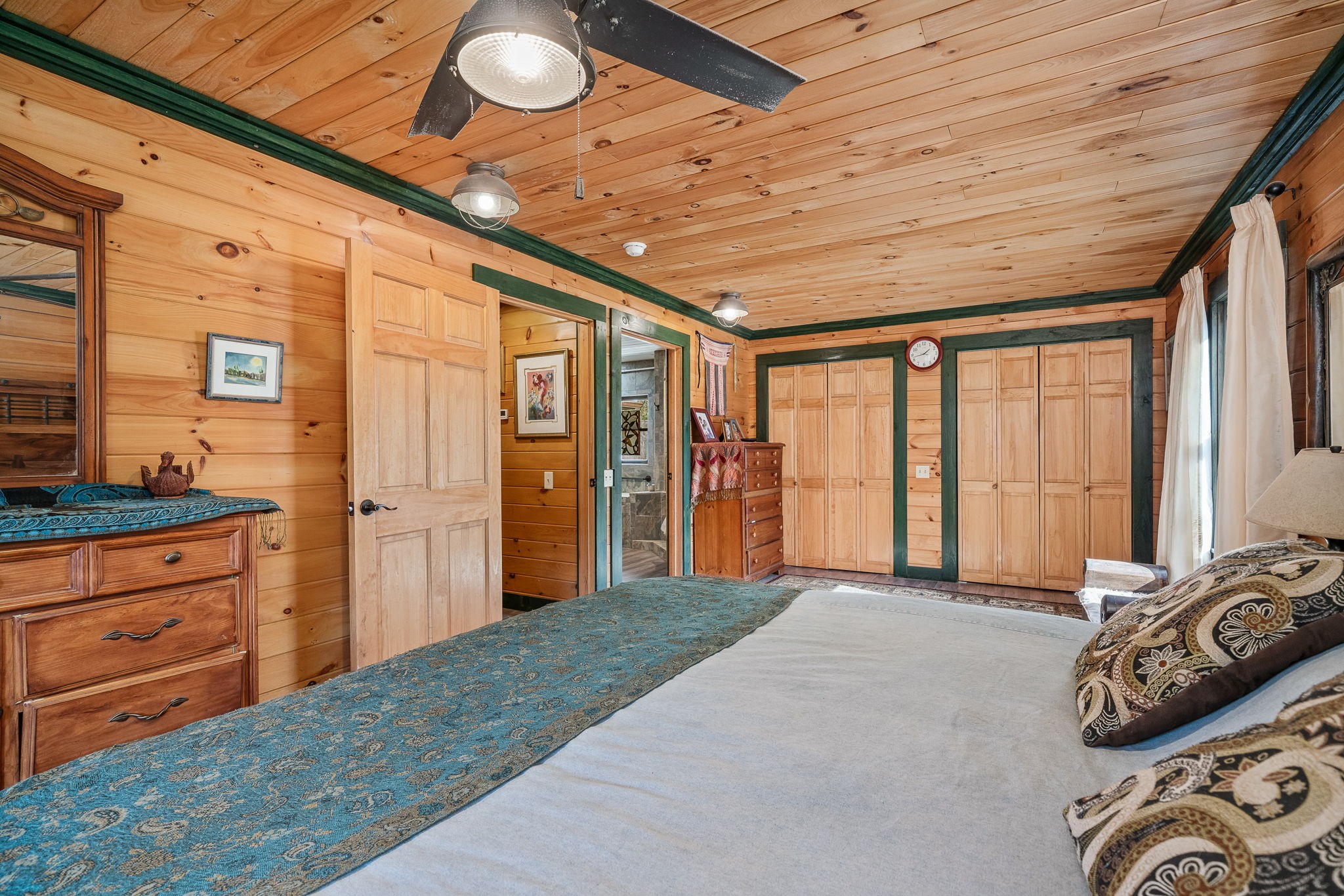 2087 Add Stafford Road Hilham, TN 38568 - Photo 12 of 43 a bed room with a bed and a dresser