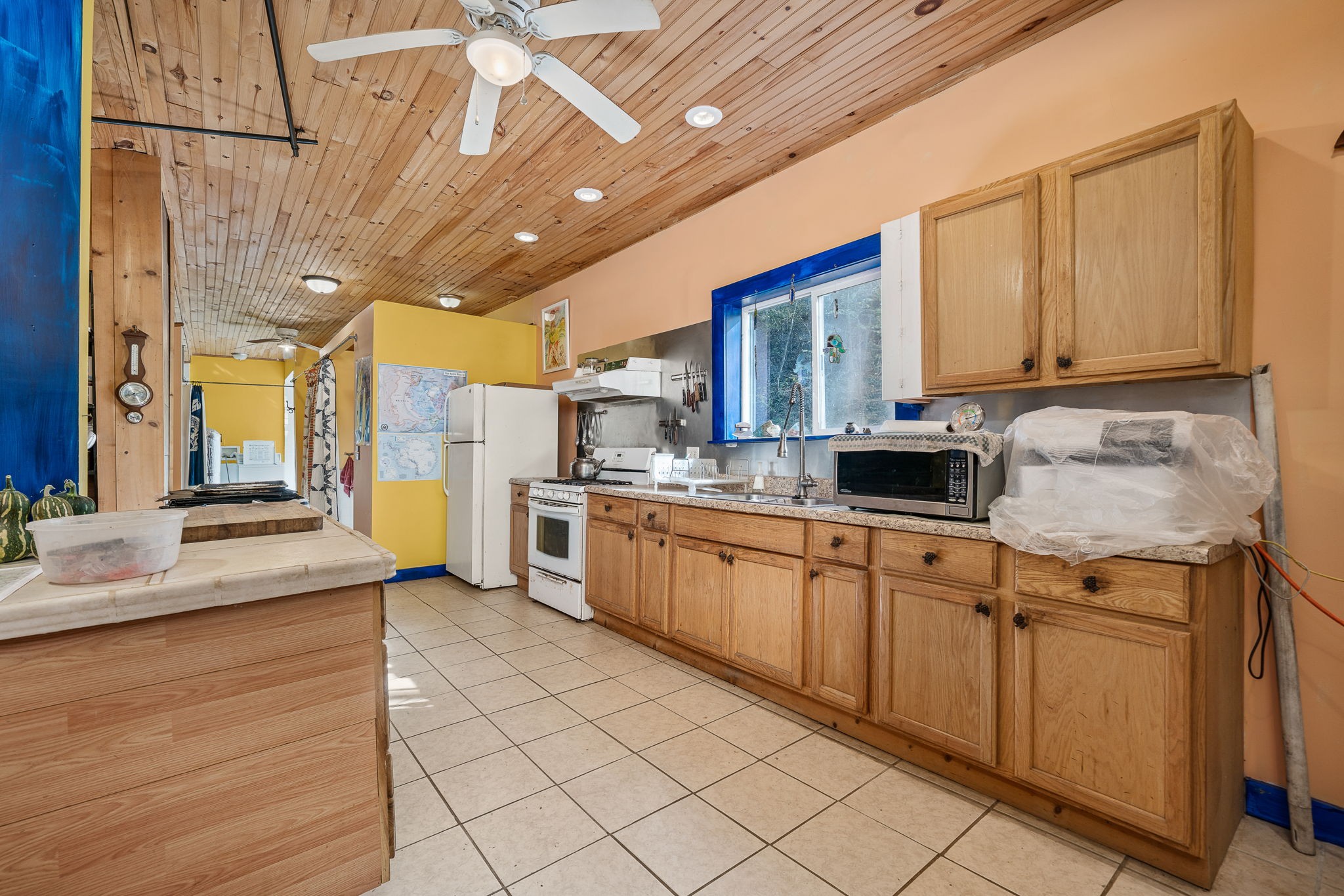 2087 Add Stafford Road Hilham, TN 38568 - Photo 19 of 43 a kitchen with a sink cabinets and window