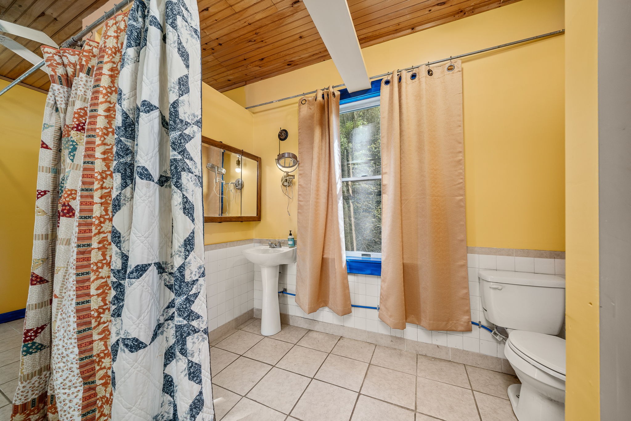 2087 Add Stafford Road Hilham, TN 38568 - Photo 21 of 43 a bathroom with a shower and a toilet