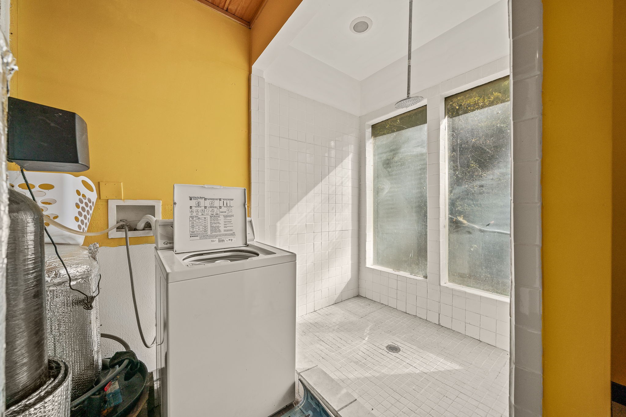 2087 Add Stafford Road Hilham, TN 38568 - Photo 22 of 43 a bathroom with a sink mirror and shower