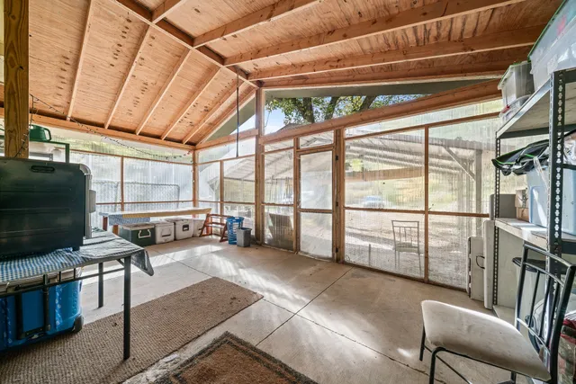 a view of a living room with furniture