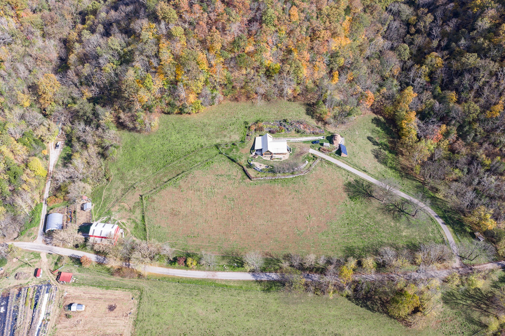 2087 Add Stafford Road Hilham, TN 38568 - Photo 32 of 43 an aerial view of a house with a yard