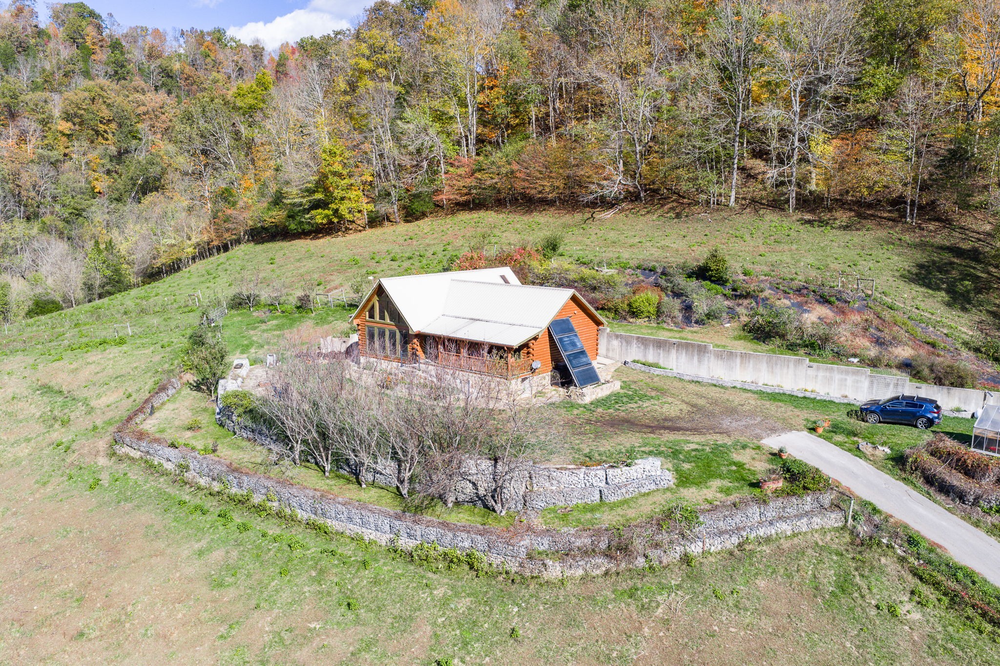 2087 Add Stafford Road Hilham, TN 38568 - Photo 35 of 43 an aerial view of a house with a yard basket ball court
