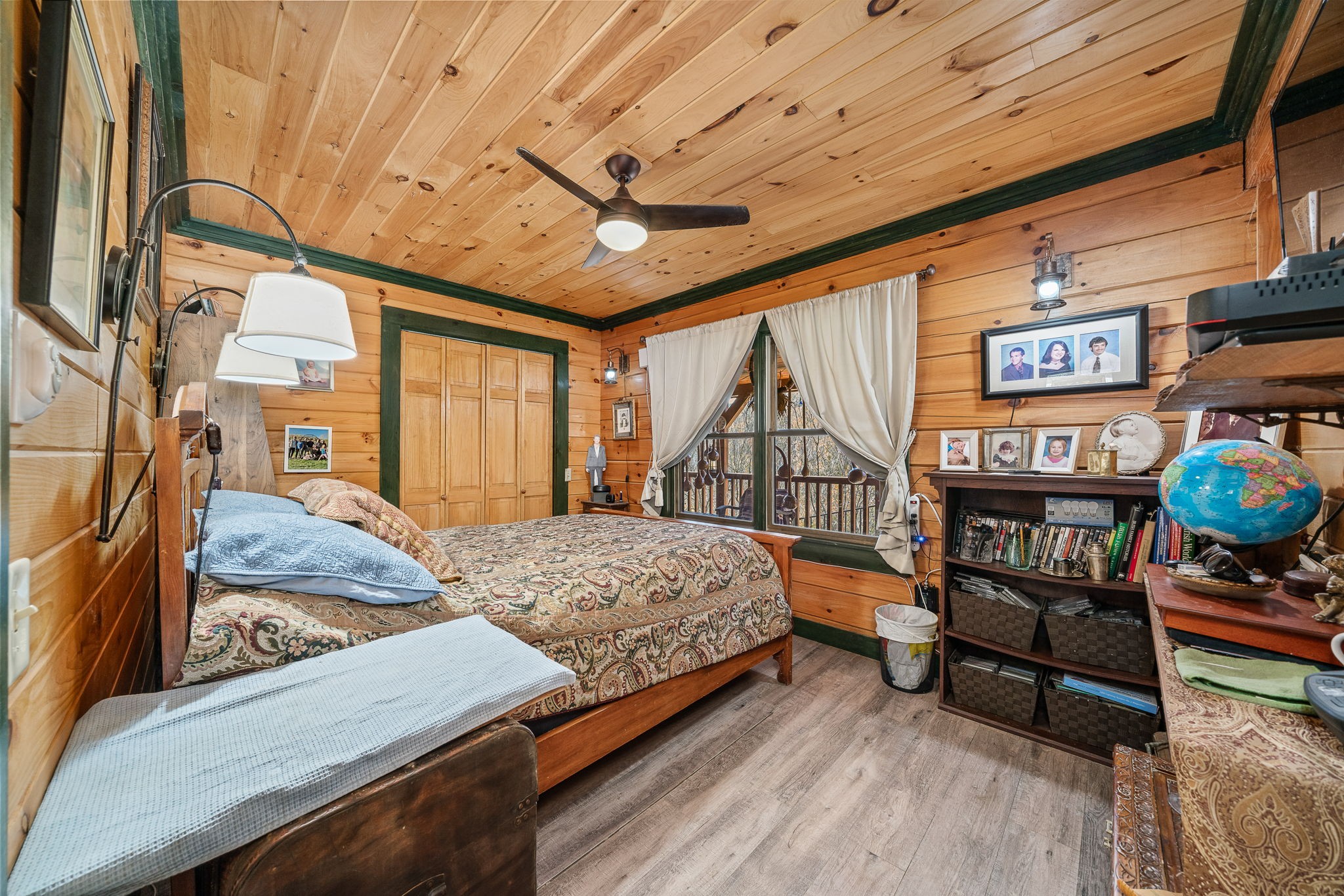 2087 Add Stafford Road Hilham, TN 38568 - Photo 9 of 43 a bedroom with furniture and a wooden floor