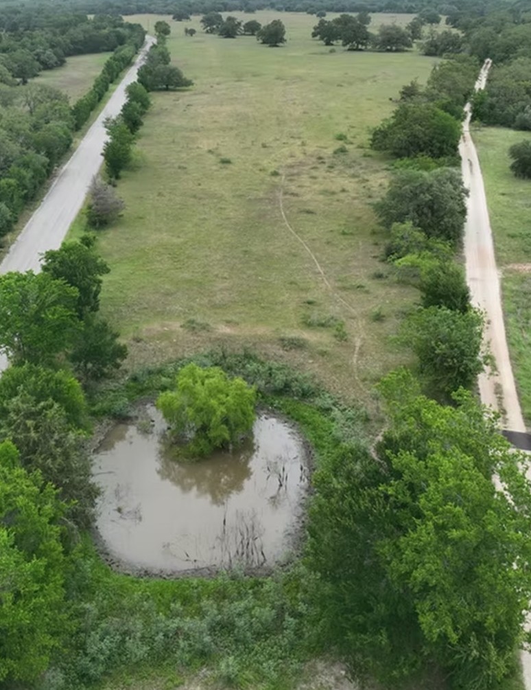 Lot 5-tbd Rd Ledbetter Tx 78946 Road Ledbetter, TX 78946 - Photo 2 of 16 Aerial view of property's location with rural landscape