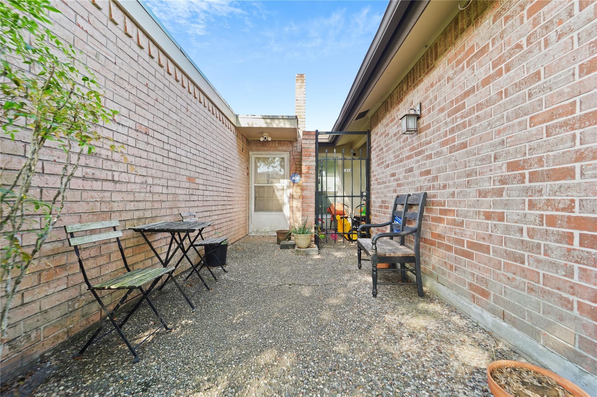 1314 Town Circle, Unit 1 Baytown, TX 77520 - Photo 11 of 17 a view of outdoor space with seating