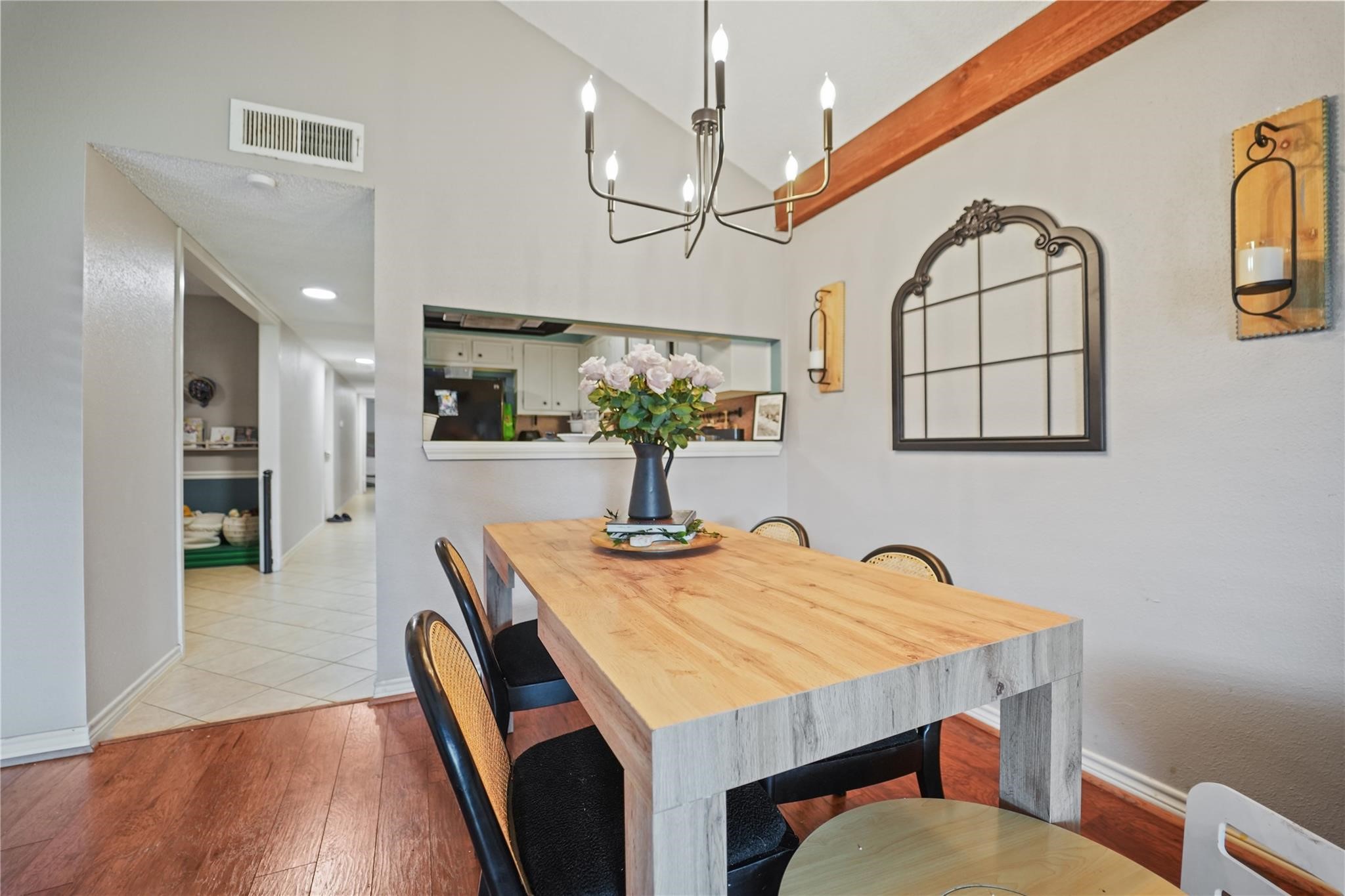 1314 Town Circle, Unit 1 Baytown, TX 77520 - Photo 2 of 17 a view of a dining room with furniture and wooden floor