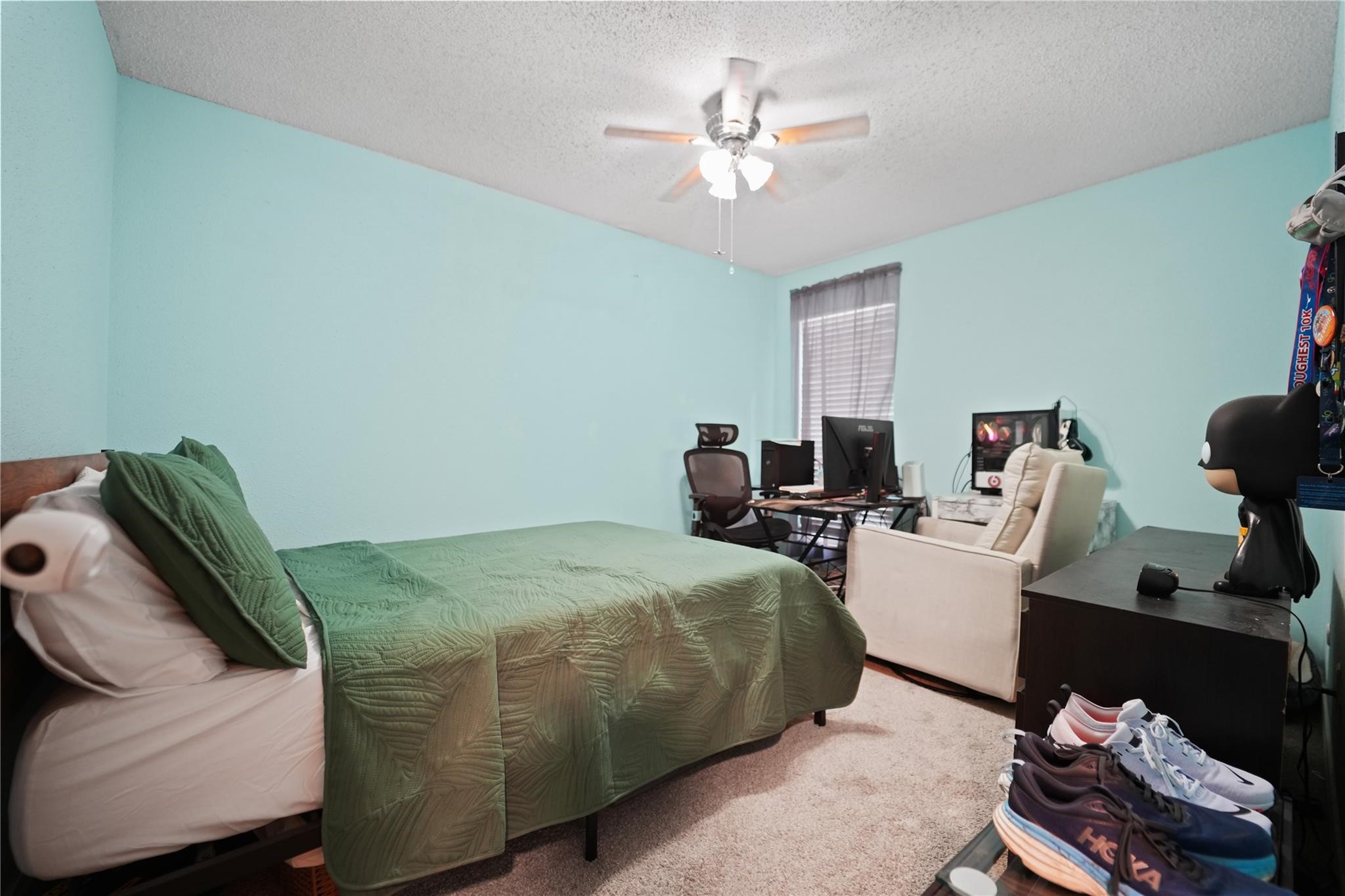 1314 Town Circle, Unit 1 Baytown, TX 77520 - Photo 9 of 17 a bedroom with a bed and window