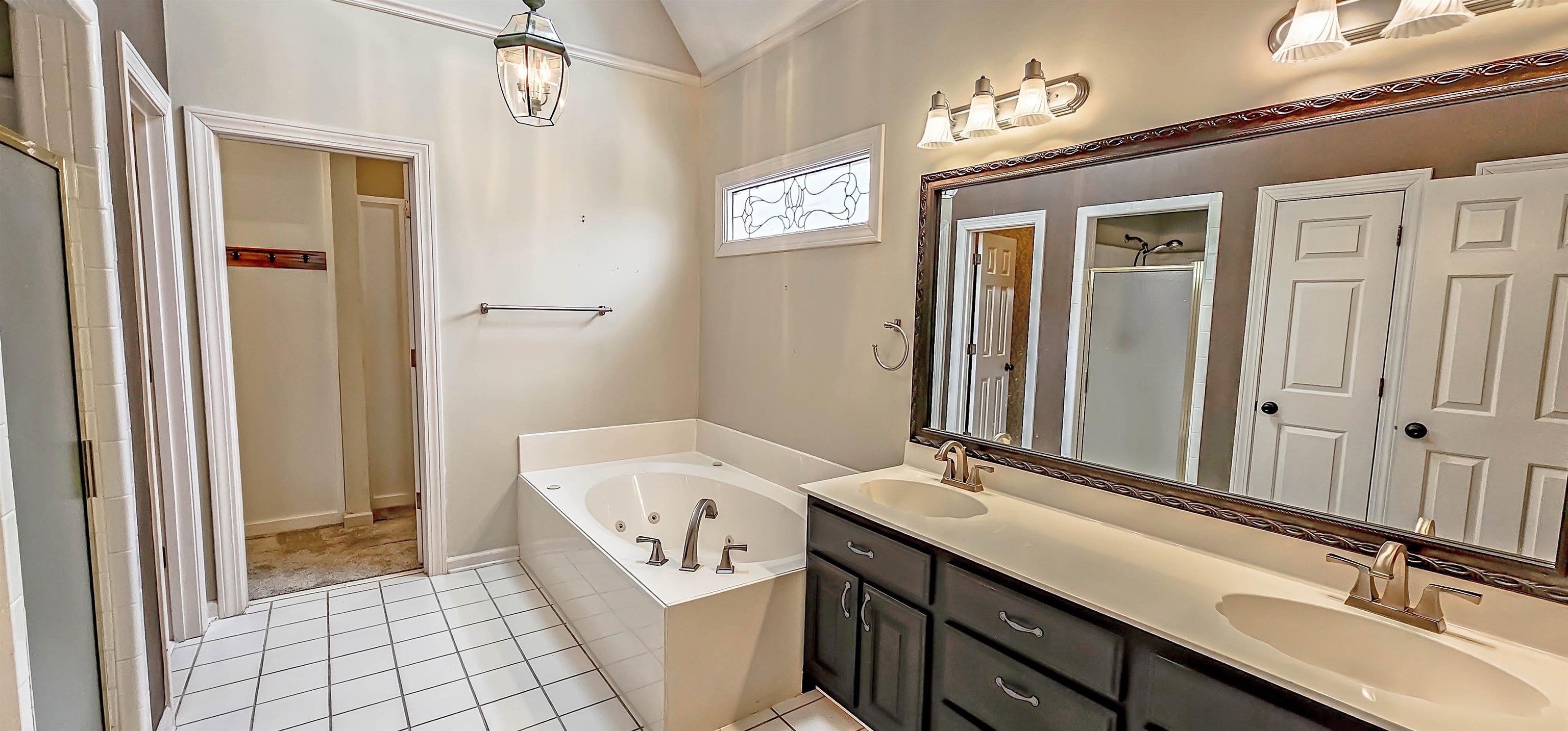 660 Weston Drive Collierville, TN 38017 - Photo 15 of 32 a bathroom with a sink double vanity