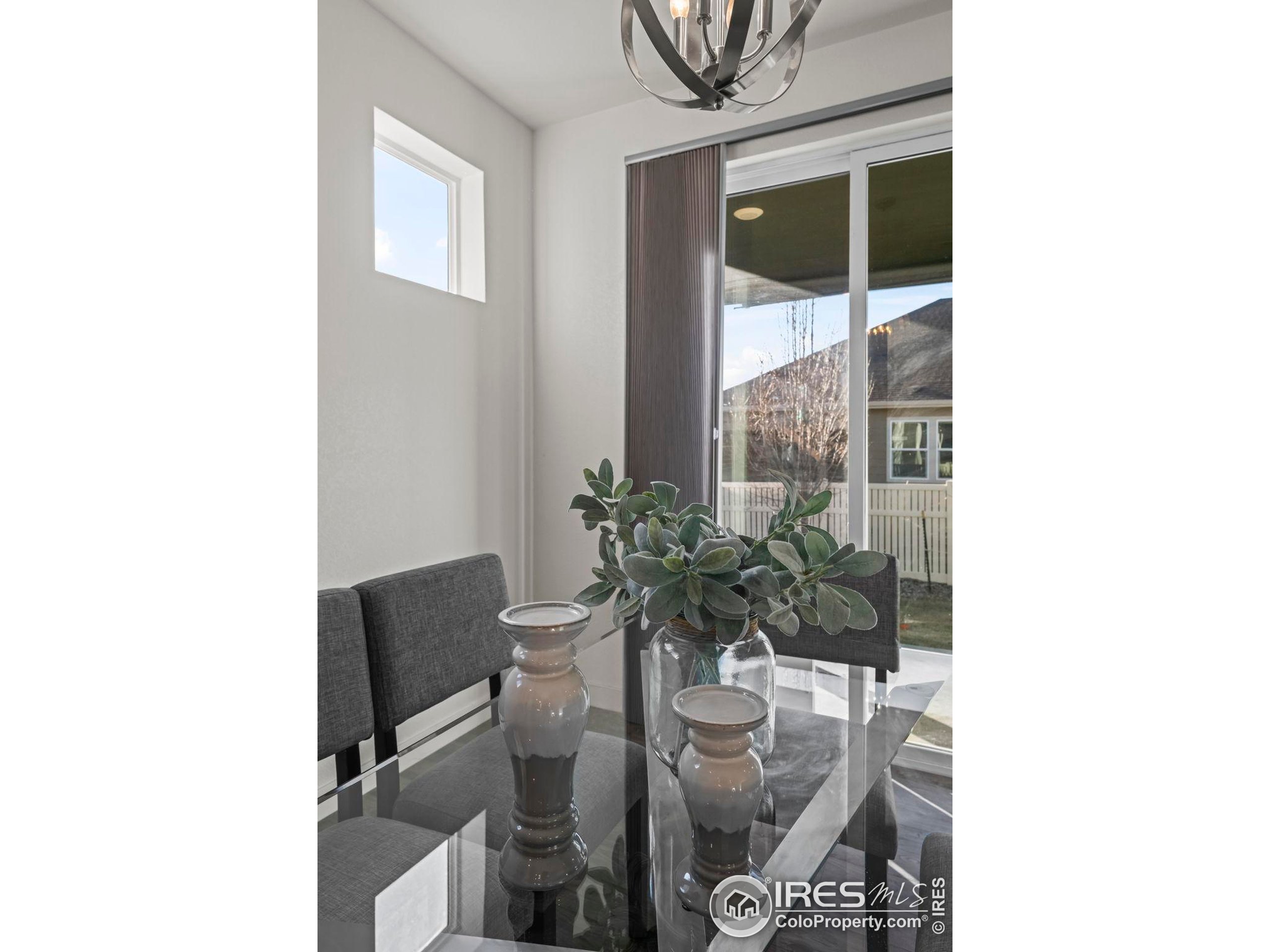 8957 Ferncrest Street Firestone, CO 80504 - Photo 22 of 50 a dining room with furniture