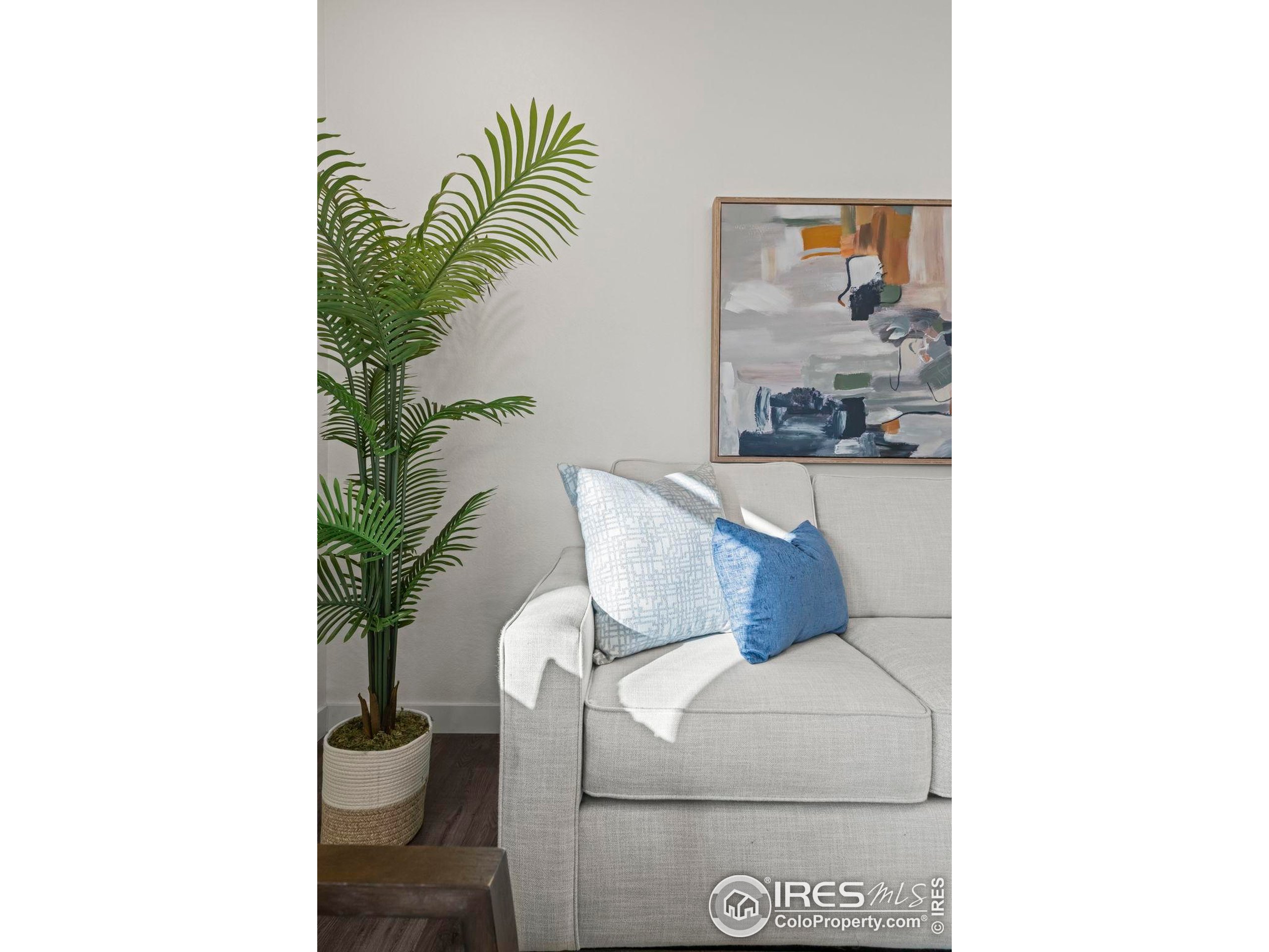 8957 Ferncrest Street Firestone, CO 80504 - Photo 27 of 50 a living room with a couch