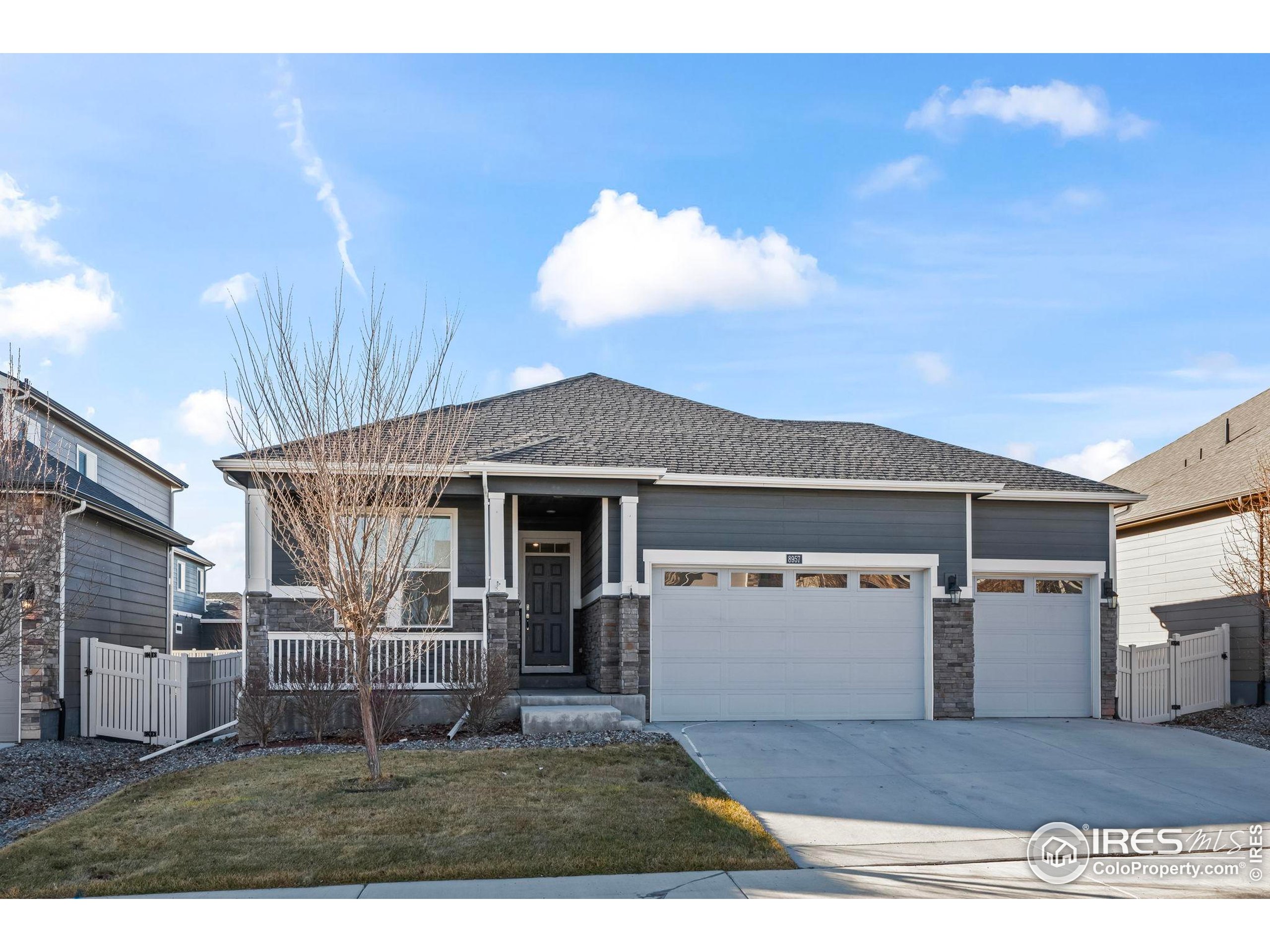 8957 Ferncrest Street Firestone, CO 80504 - Photo 4 of 50 a view of house with yard
