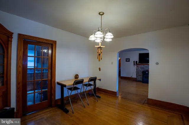 a living room with fireplace furniture and a flat screen tv