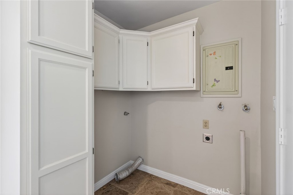 6845 Barcelona Way Riverside, CA 92504 - Photo 9 of 17 Indoor laundry room adjacent to the kitchen.