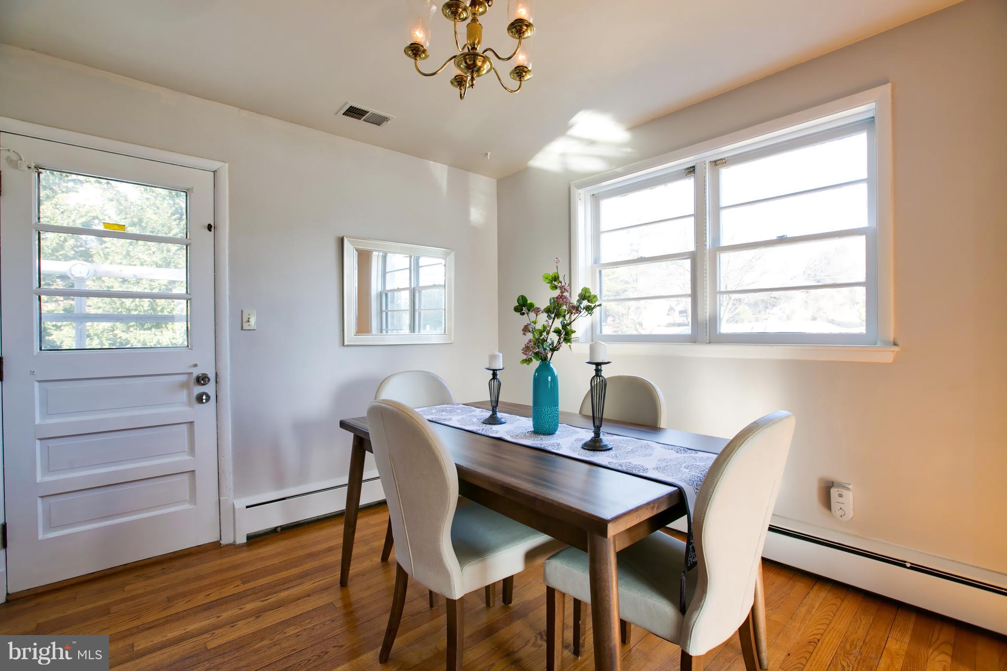 324 Aigburth Road Towson, MD 21286 - Photo 7 of 29 a dining room with furniture and window
