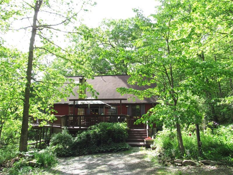 207 Clinton Road Normalville, PA 15469 - Photo 1 of 25 Sportsmen delight! Approximately 32 wooded acres that YOU, the deer & other wildlife will enjoy the existing trails or make your own! Behind the right side shutters is the dining room, then the kitchen, and the the living room. But first, Poplar Run!