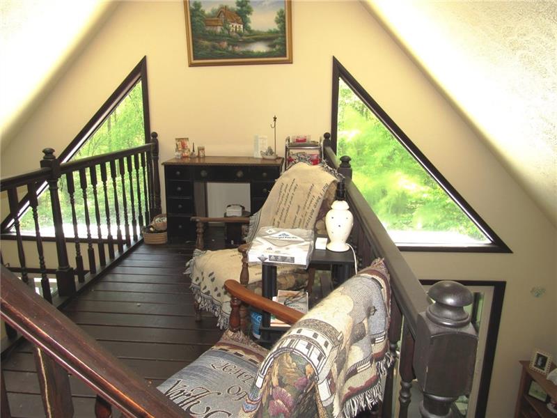 207 Clinton Road Normalville, PA 15469 - Photo 15 of 25 What would you use this space for? How about those custom windows!