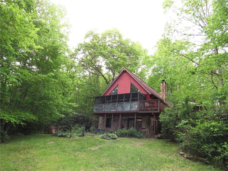 207 Clinton Road Normalville, PA 15469 - Photo 20 of 25 We stepped outside and are looking back at the home.