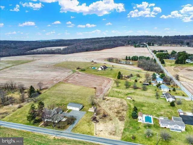 a view of a swimming pool with an ocean view