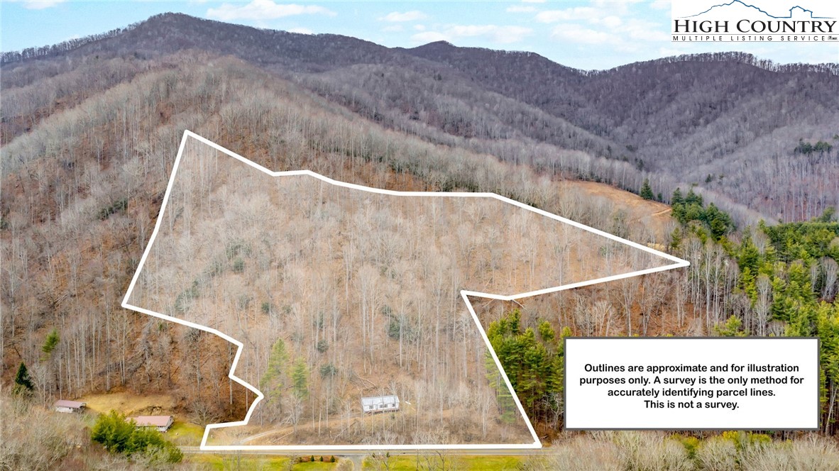 3303 Old Highway 16 Lansing, NC 28643 - Photo 1 of 30 a view of a back yard