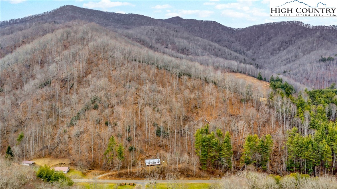 3303 Old Highway 16 Lansing, NC 28643 - Photo 7 of 30 a view of a dry field with mountains in the background