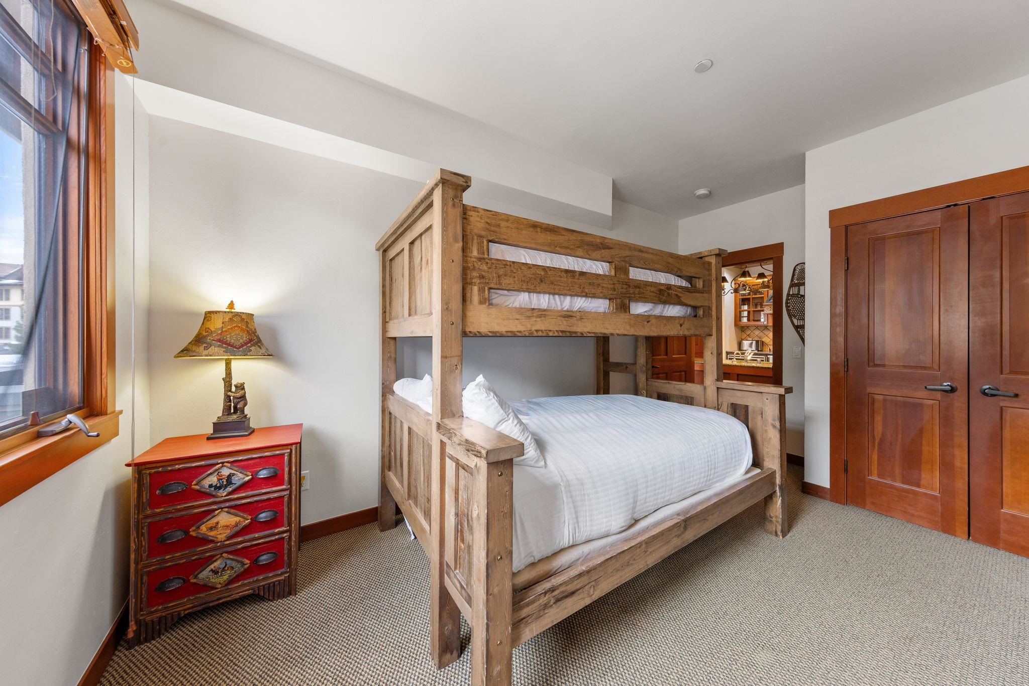 1985 Olympic Vly Road, Unit 216 (2216) Olympic Valley, CA 96146 - Photo 17 of 25 a bedroom with a bed and a window