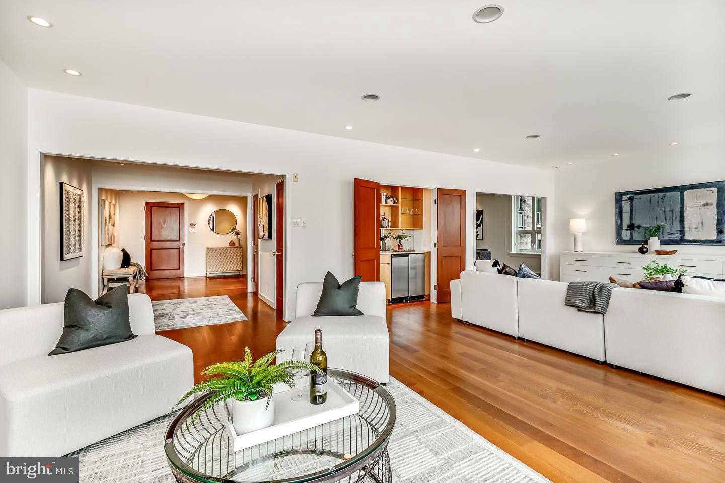 1820 Rittenhouse Square, Unit 1601 Philadelphia, PA 19103 - Photo 12 of 53 a living room with furniture or couch and a flat screen tv