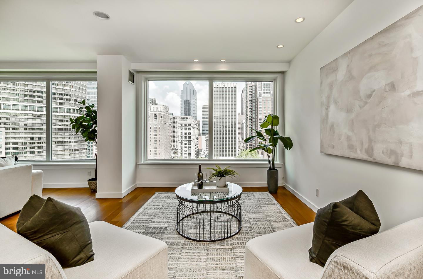 1820 Rittenhouse Square, Unit 1601 Philadelphia, PA 19103 - Photo 13 of 53 a living room with furniture and a large window
